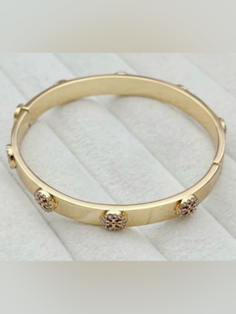 Tory Burch Gold Tone Bangle with Decorative Medallions Medium Size